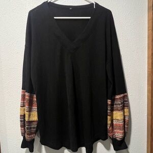 Elegant Black V-Neck Top with Colorful Sleeves